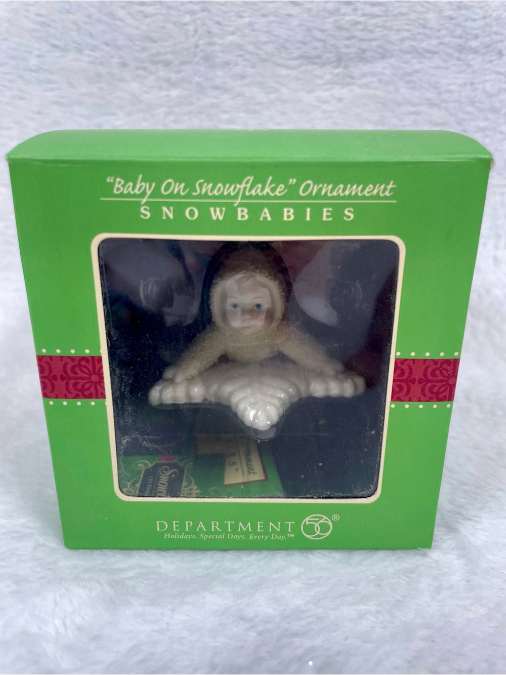 2007 Snowbabies BABY ON SNOWFLAKE Ornament Dept 56 - Laying Down - #799489